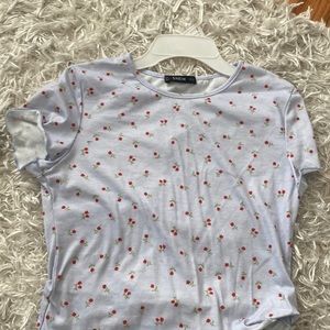 purple tone shirt with roses